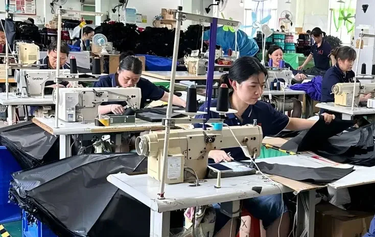 Umbrella panels being sewn on sewing machines — industry process reference